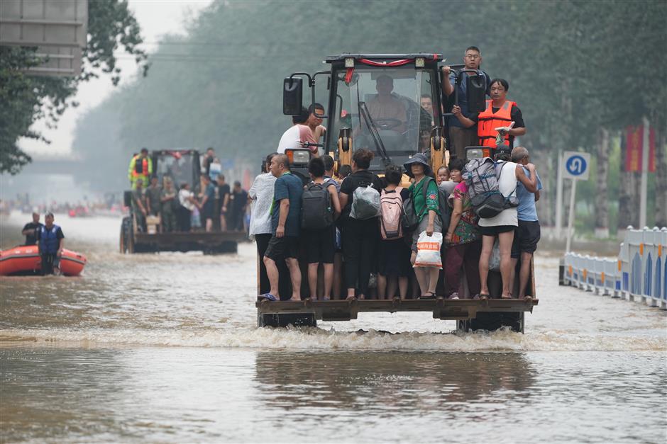 Battered by heavy rainfall, Zhuozhou fights through deadly floods