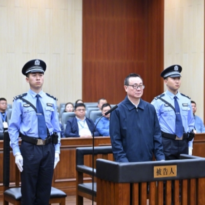 Former VP of China Development Bank stands trial for bribe-taking