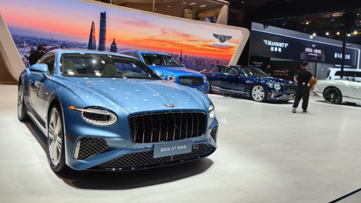 Cars that ooze extravagance have faded from public spectacle at this year's Auto Shanghai