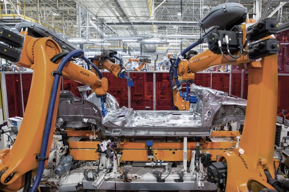Auto industry accelerates annual growth, industrial output