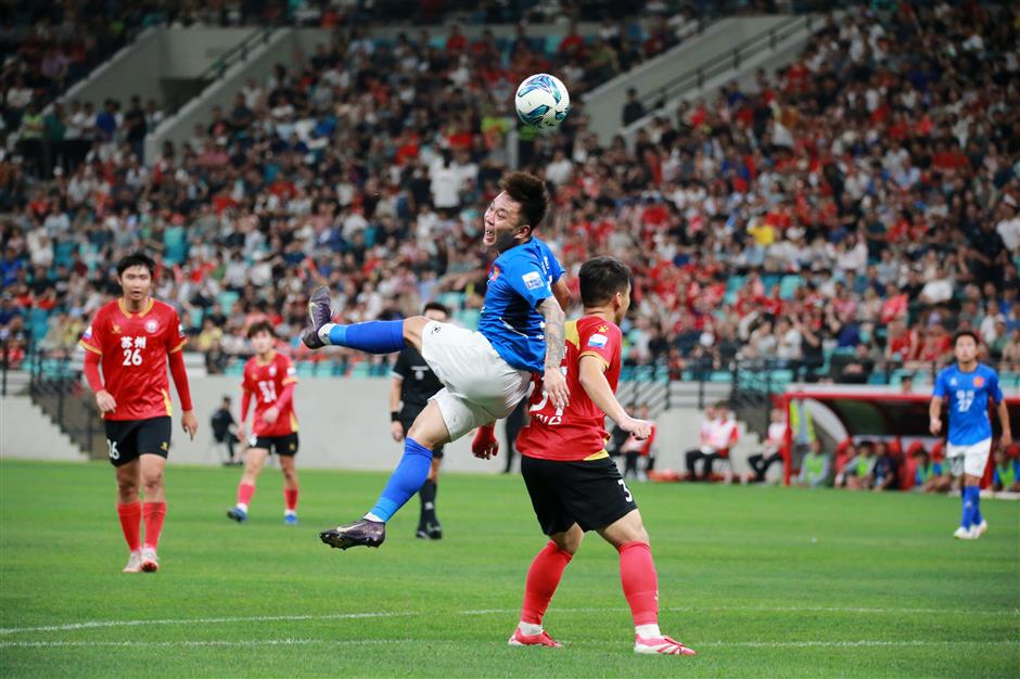 How a $1 football ticket offers a front-row seat to China's economy?