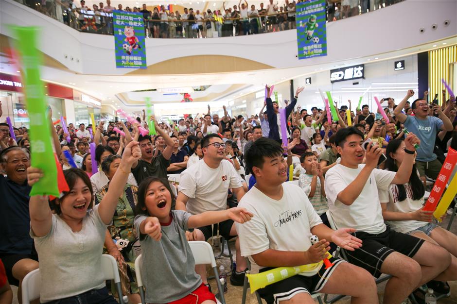 How a $1 football ticket offers a front-row seat to China's economy?