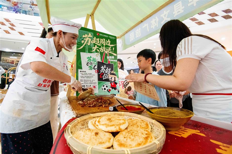 How a $1 football ticket offers a front-row seat to China's economy?
