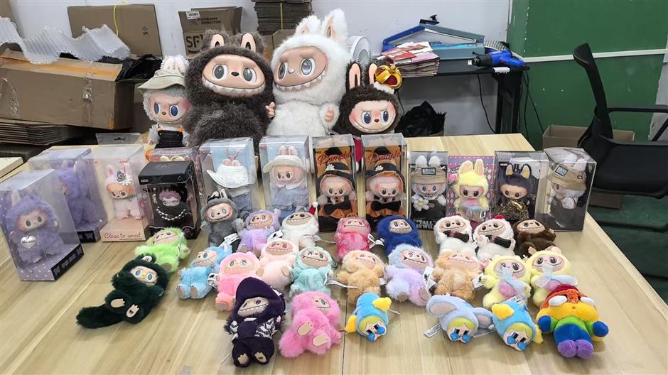 8 detained as Shanghai police bust gang selling counterfeit Labubu products