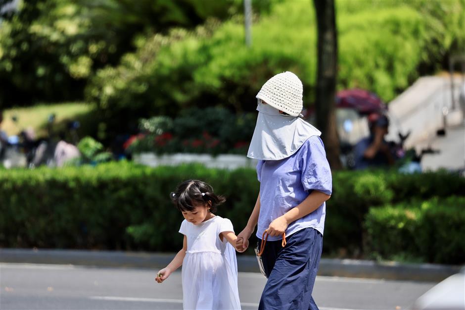 Brief relief ahead for back-to-school week after Shanghai swelters through record-breaking heatwave