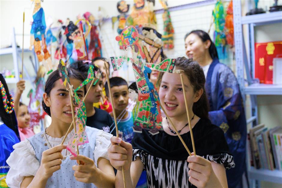 Chinese shadow puppetry survives with new performers, global audiences
