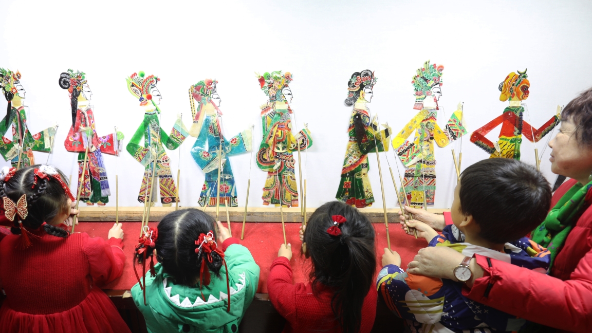 Chinese shadow puppetry survives with new performers, global audiences