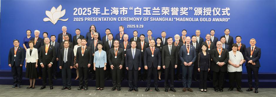 2 expatriates awarded honorary citizenship