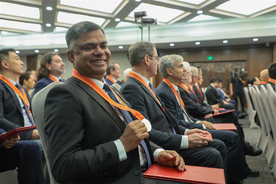 2 expatriates awarded honorary citizenship