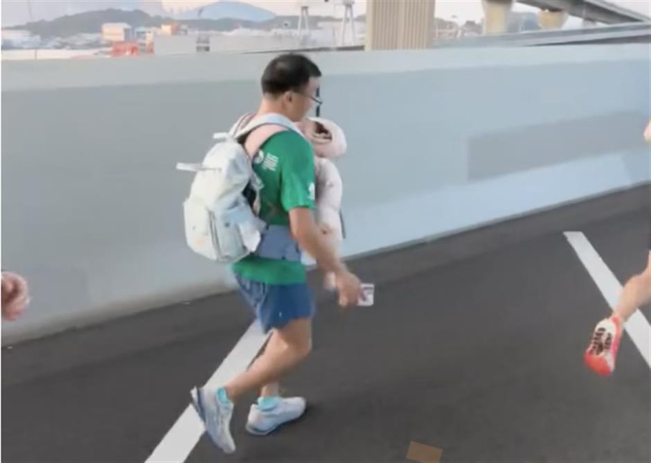 Runner Carrying Infant in Hong Kong Marathon Triggers Probe