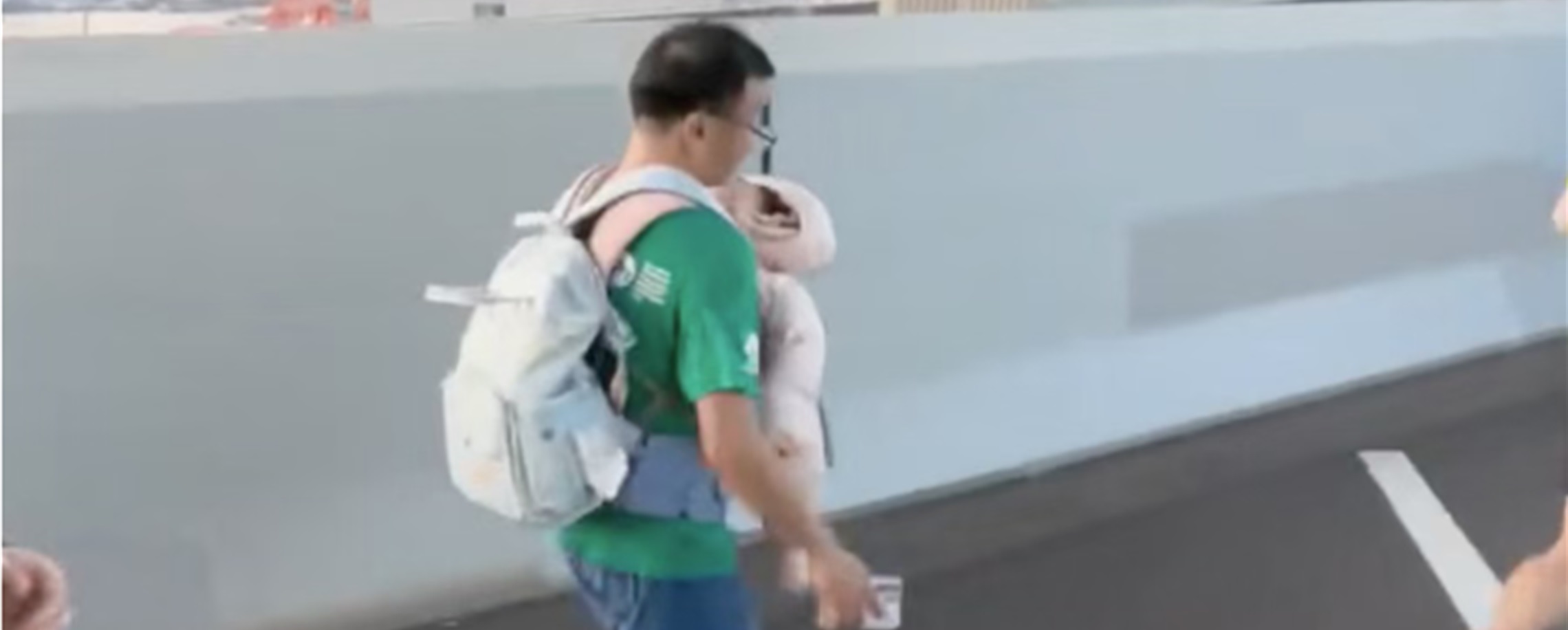 Runner Carrying Infant in Hong Kong Marathon Triggers Probe