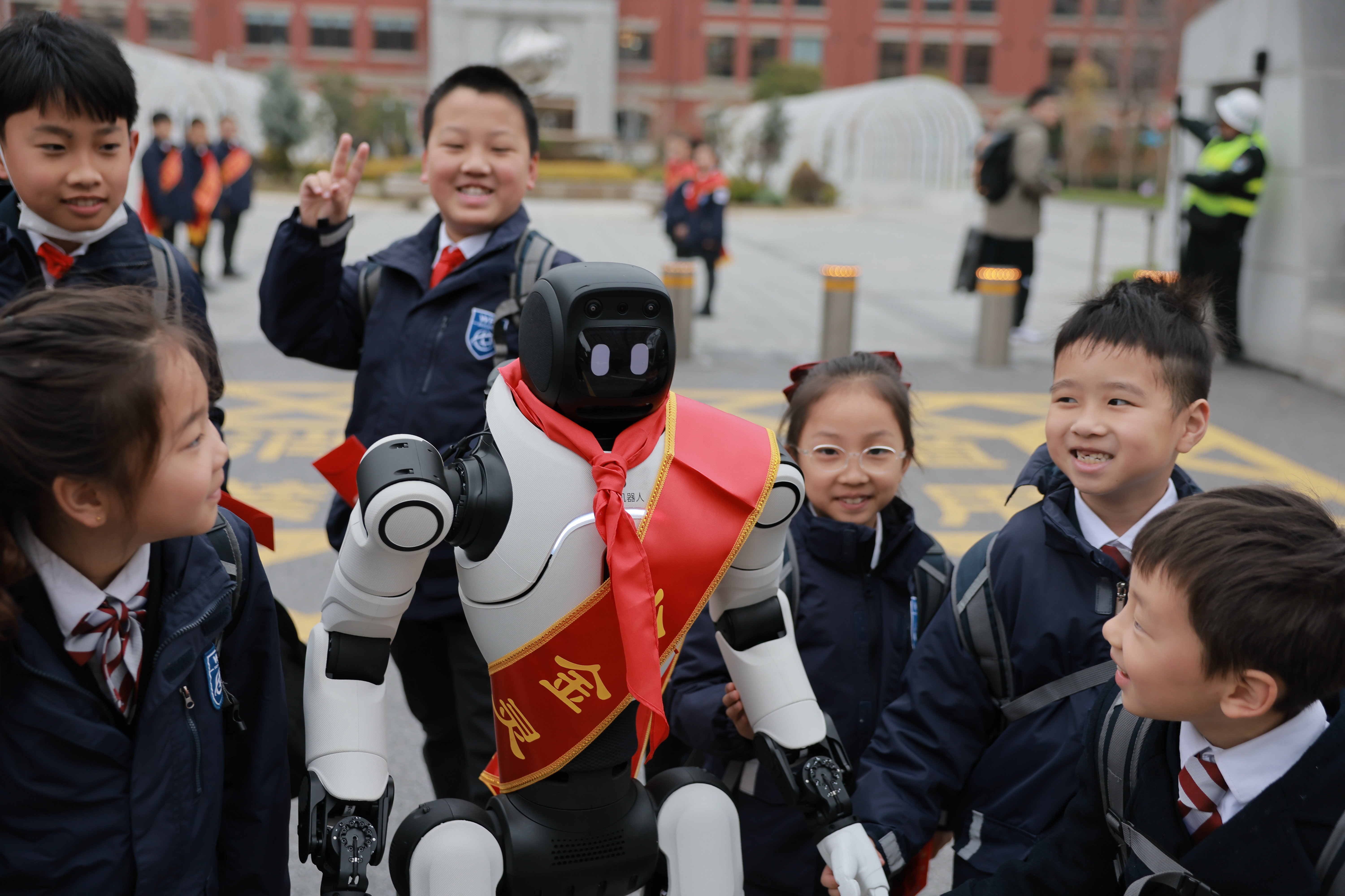 Robot Greetings as Shanghai Students Return for Spring Semester