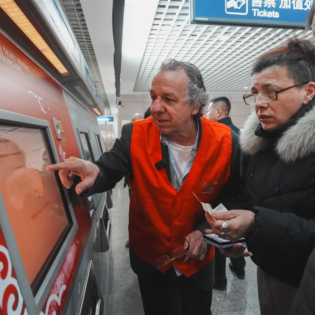 'You're On Your Way:' The American Professor Guiding Arrivals at Shanghai's Gates