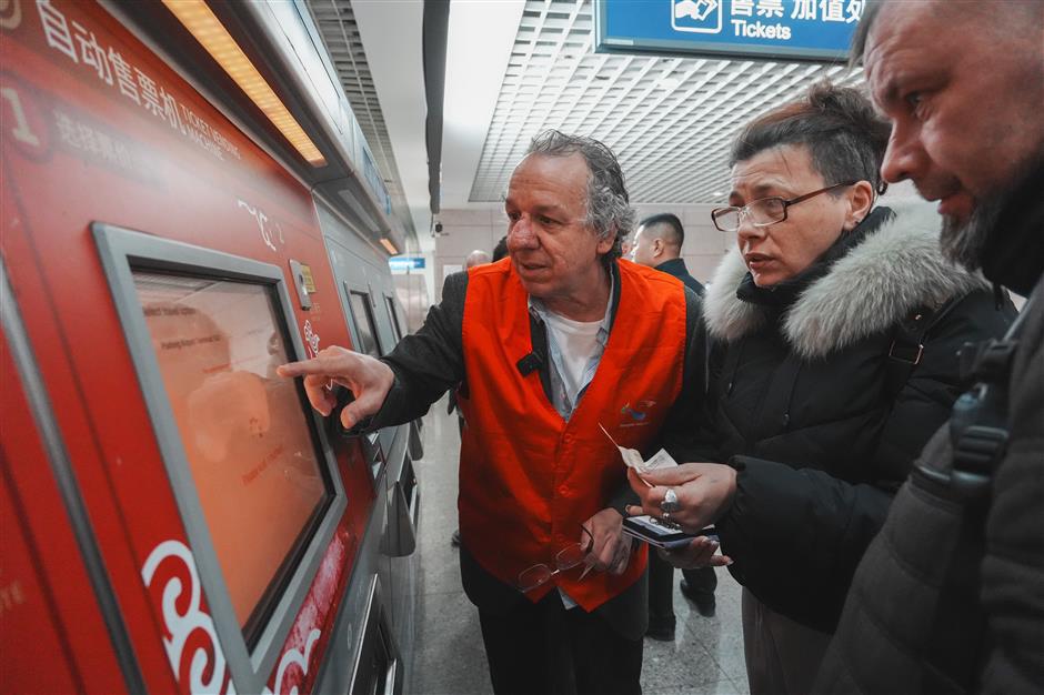'You're On Your Way:' The American Professor Guiding Arrivals at Shanghai's Gates