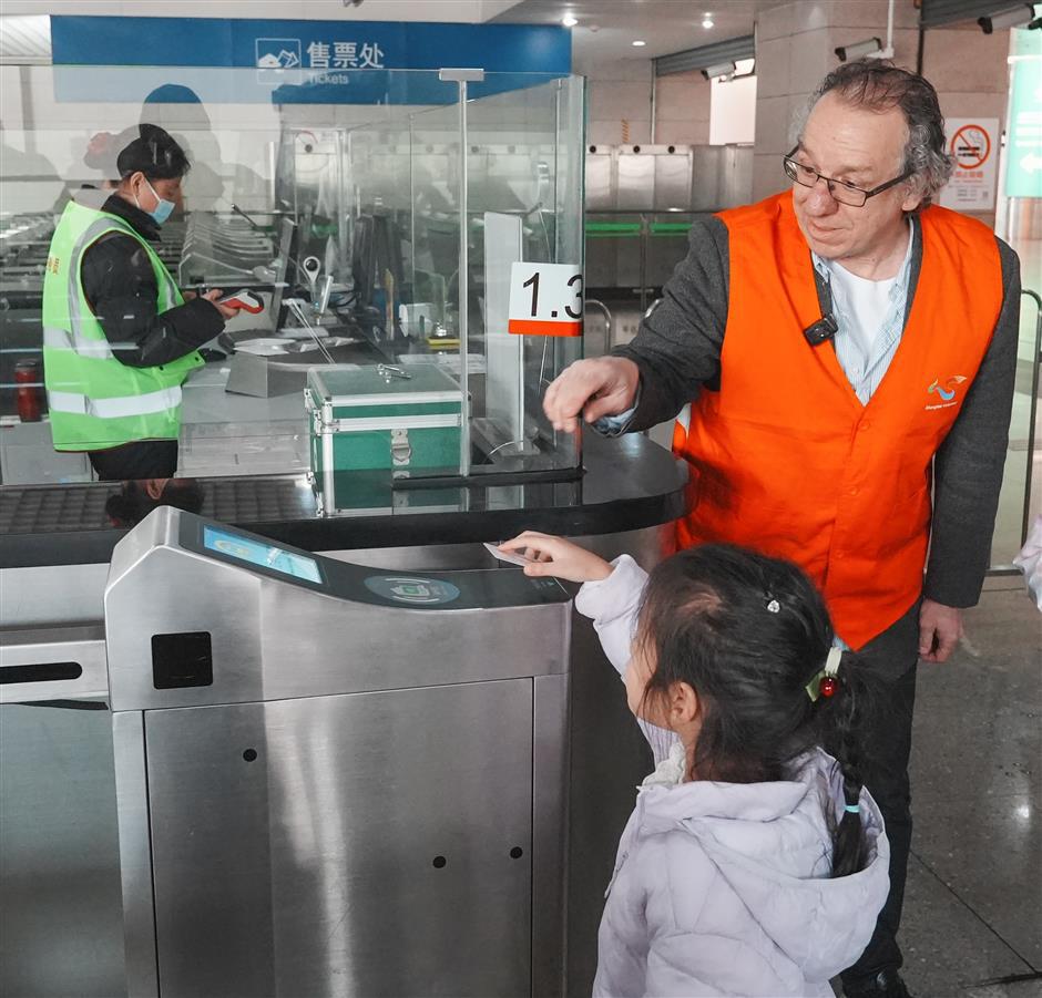 'You're On Your Way:' The American Professor Guiding Arrivals at Shanghai's Gates