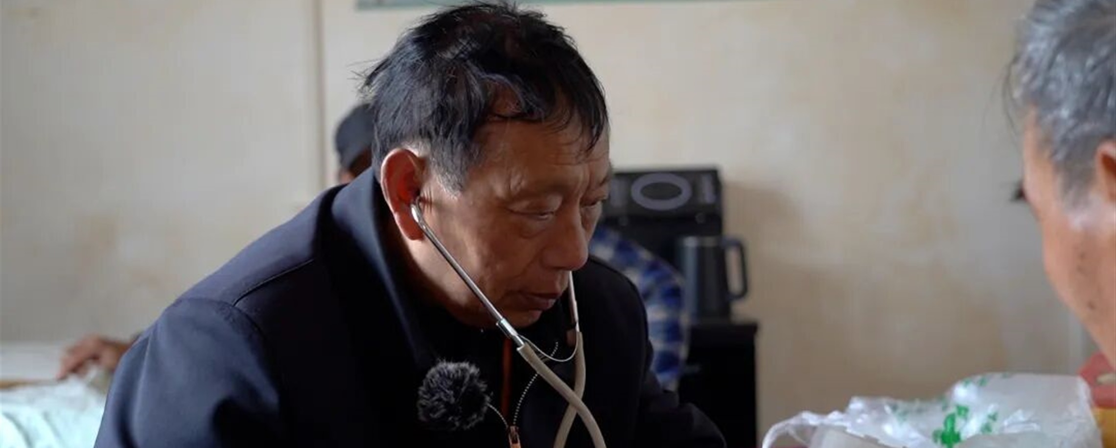 China's 'Mountain 120': After 70,000 Trips and 9 Motorbikes, This Rural Doctor Still Answers the Call