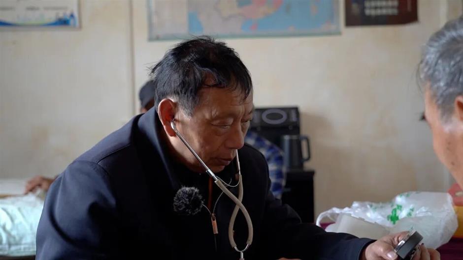 China's 'Mountain 120': After 70,000 Trips and 9 Motorbikes, This Rural Doctor Still Answers the Call