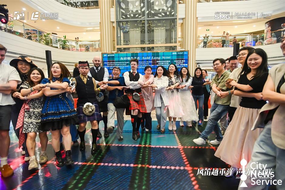 Scottish Bagpipes Weave Flash Mob Magic on Iconic Street
