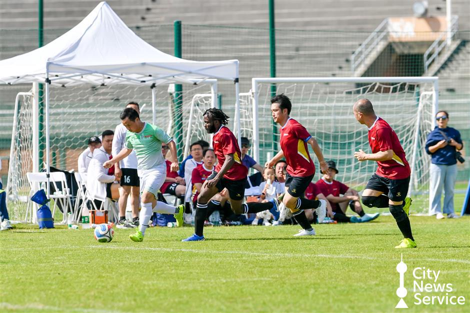 Charity match raises US$11,444 for football program in Yunnan