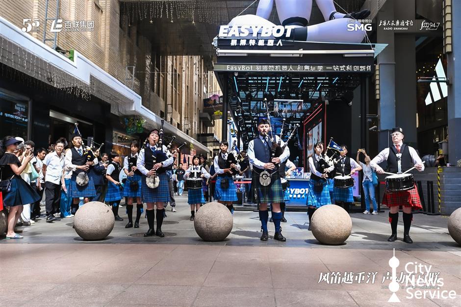 Scottish Bagpipes Weave Flash Mob Magic on Iconic Street