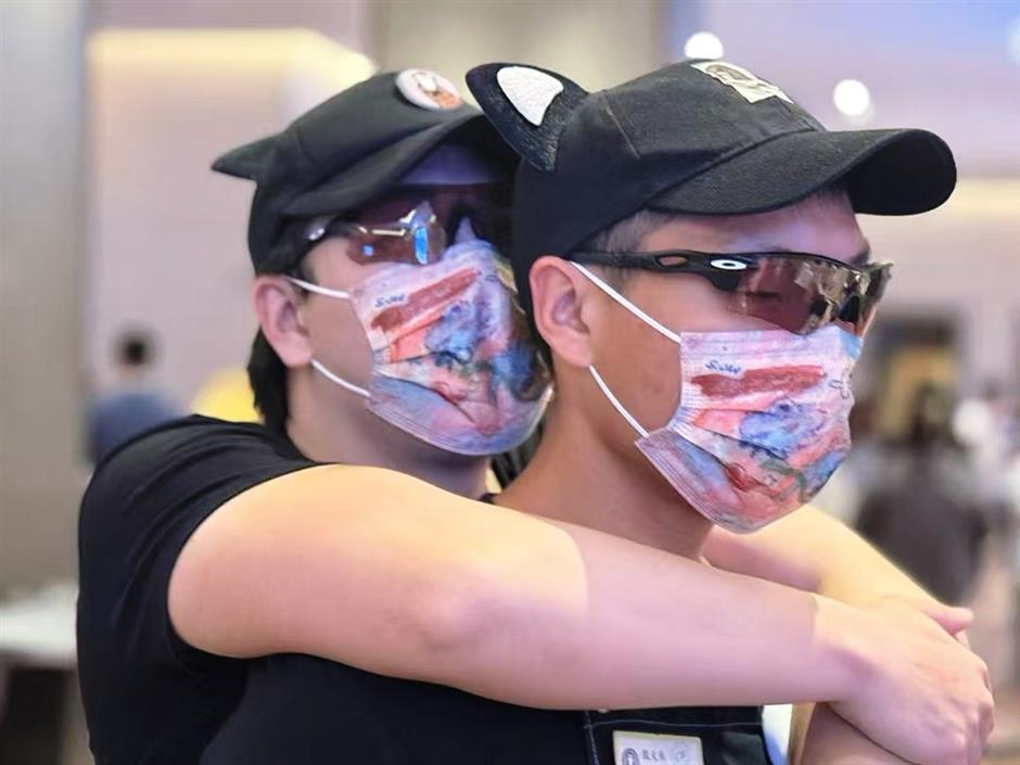 [A City for All] 'We Just Keep Going': Twin Brothers Move Through Shanghai Without Sight