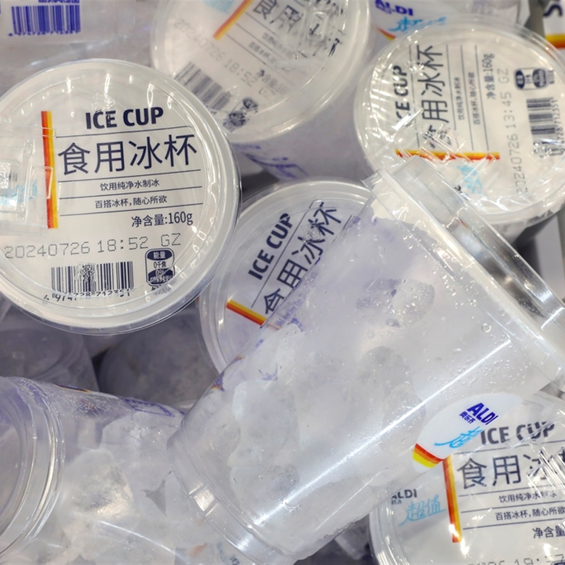 Ice Cups: Frozen Water as Hot Engine for Summer Consumption