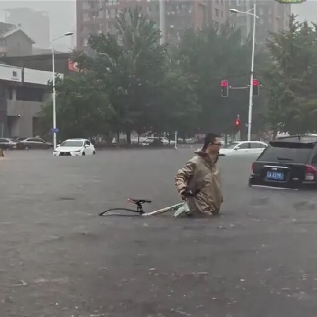 Doctor Wades Through Waist-Deep Floodwater to Reach Surgery