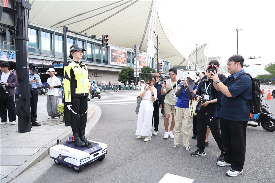 Humanoid Traffic Robots Debut Outside WAIC 2026 Venue
