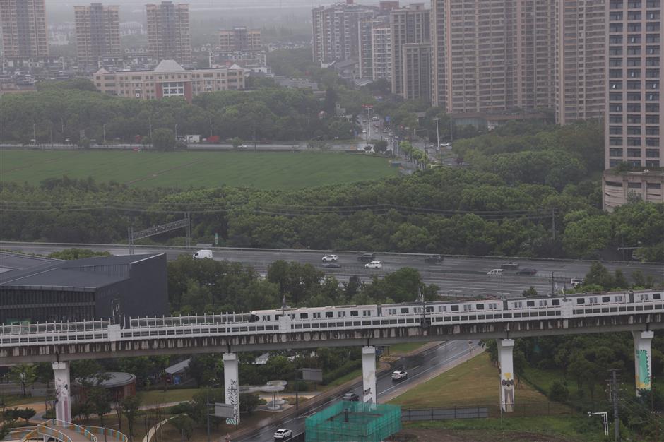 Shanghai Issues Red Rainstorm Warning As Typhoon Dolphin Nears