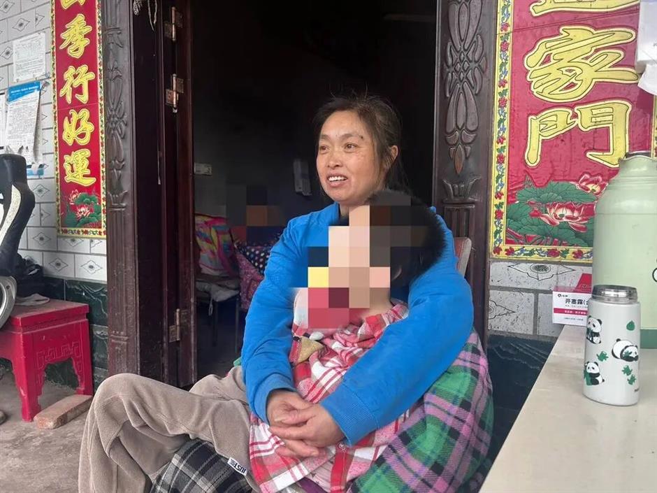 Sichuan Mother Refuses to Give Up on 2 Daughters With Cerebral Palsy